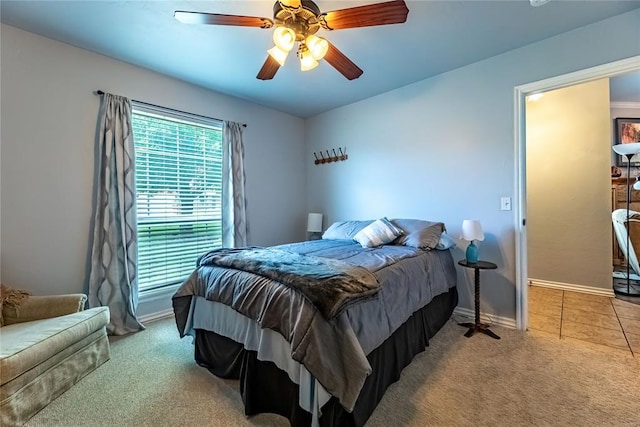 3305 Tecumseh Meadows Way, Norman, OK 73069 - carpeted bedroom with baseboards and a ceiling fan