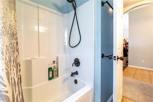 3305 Tecumseh Meadows Way, Norman, OK 73069 - bathroom featuring shower / tub combo with curtain, tile patterned floors, and baseboards