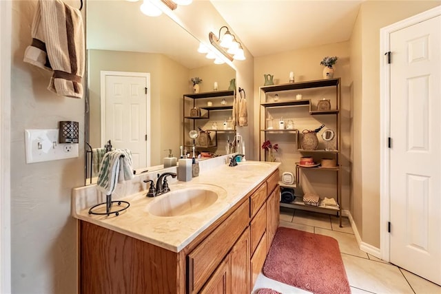 3305 Tecumseh Meadows Way, Norman, OK 73069 - bathroom with tile patterned flooring, double vanity, and baseboards