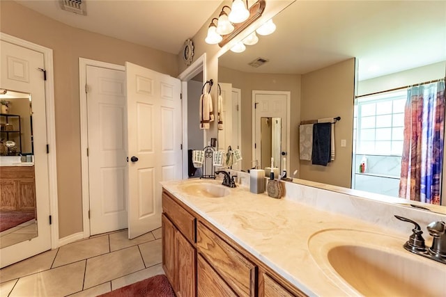 3305 Tecumseh Meadows Way, Norman, OK 73069 - bathroom with tile patterned floors and double vanity