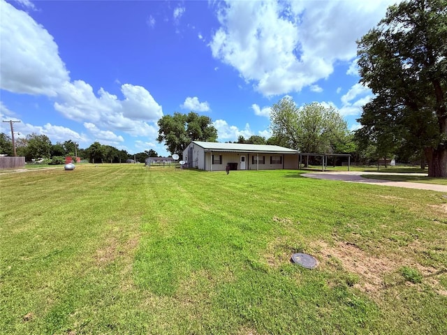 312 N 6th St, Amber, OK 73004 - view of grassy yard with driveway