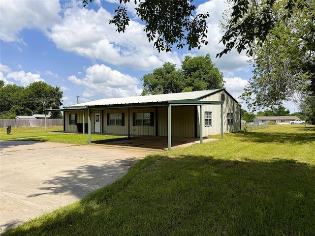 312 N 6th St, Amber, OK 73004 - view of front of home featuring a carport and driveway