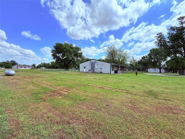 312 N 6th St, Amber, OK 73004 - view of yard featuring a pole building and an outdoor structure