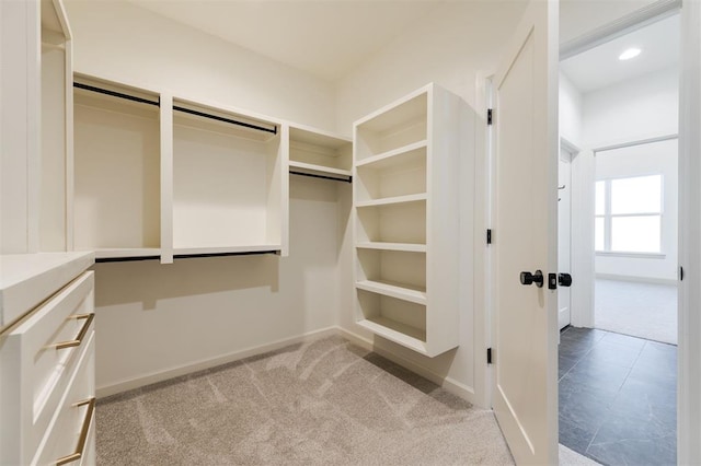 9213 NW 85th St, Yukon, OK 73099 - walk in closet featuring light carpet