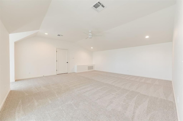 9213 NW 85th St, Yukon, OK 73099 - additional living space with lofted ceiling, light carpet, recessed lighting, a ceiling fan, and baseboards