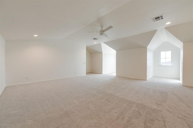 9213 NW 85th St, Yukon, OK 73099 - bonus room with vaulted ceiling, a ceiling fan, light colored carpet, baseboards, and recessed lighting