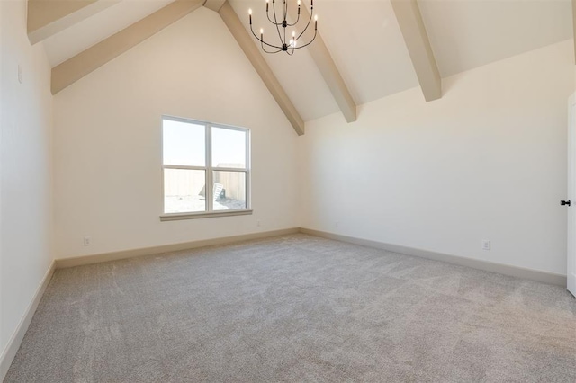 9213 NW 85th St, Yukon, OK 73099 - empty room featuring a chandelier, beam ceiling, light colored carpet, baseboards, and high vaulted ceiling