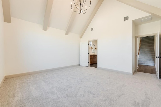 9213 NW 85th St, Yukon, OK 73099 - unfurnished bedroom with high vaulted ceiling, a chandelier, carpet floors, beam ceiling, and baseboards