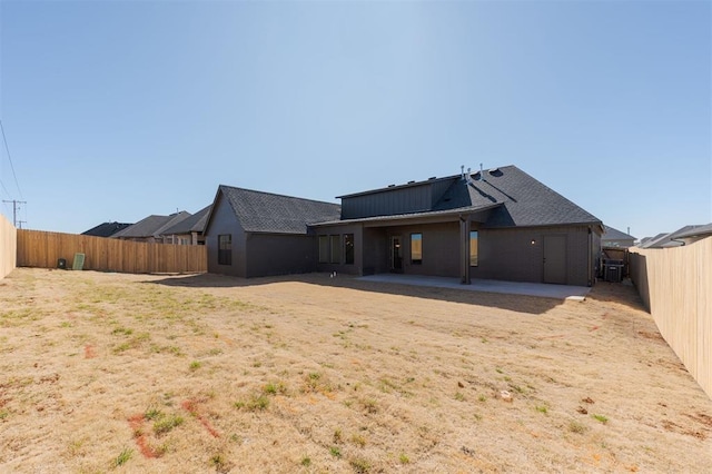 9213 NW 85th St, Yukon, OK 73099 - back of house with a patio area and a fenced backyard