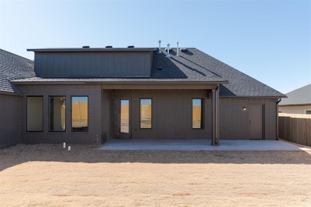 9213 NW 85th St, Yukon, OK 73099 - back of house featuring a patio, brick siding, and fence