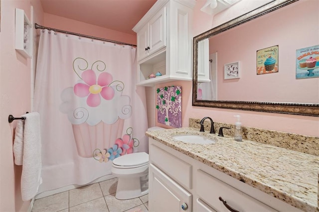 7941 E Sorghum Mill Rd, Edmond, OK 73034 - full bathroom with vanity, tile patterned flooring, toilet, and shower / tub combo with curtain