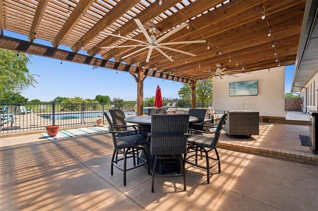 7941 E Sorghum Mill Rd, Edmond, OK 73034 - view of patio / terrace with ceiling fan, a pergola, and outdoor dining area
