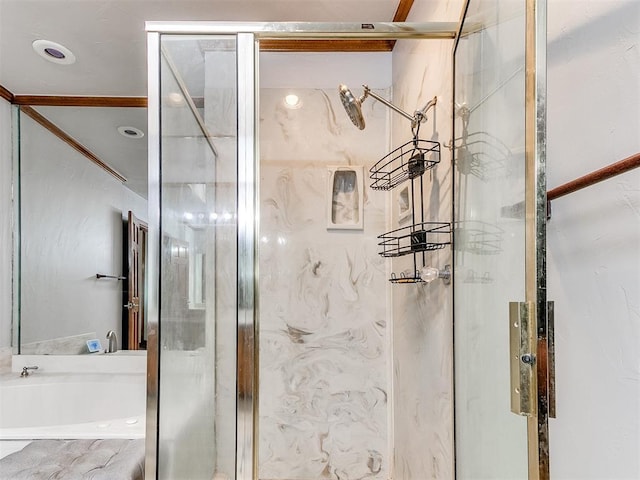 bathroom featuring a marble finish shower and a bath