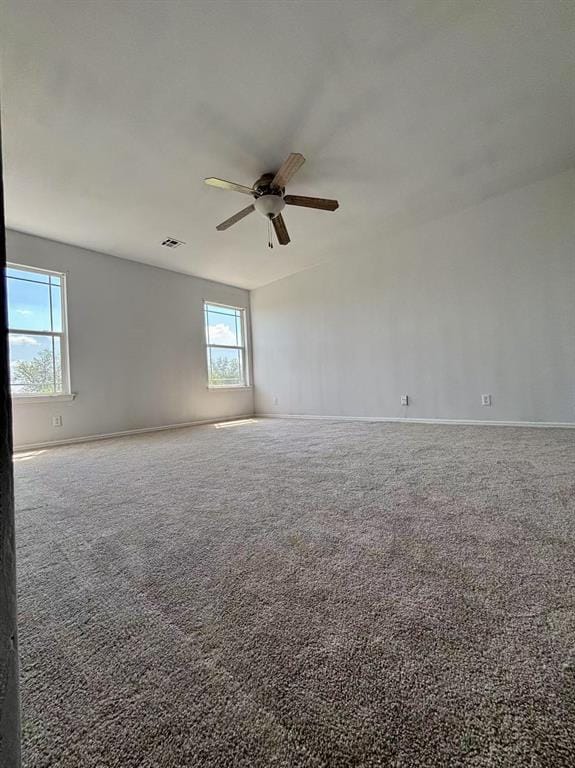 1918 W K Ct, Jenks, OK 74037 - carpeted empty room featuring a ceiling fan and baseboards