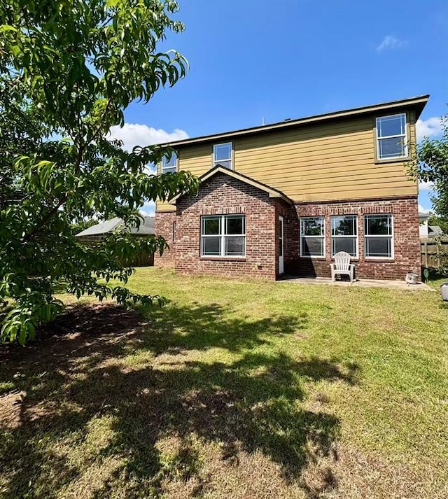 1918 W K Ct, Jenks, OK 74037 - back of property with brick siding and a lawn