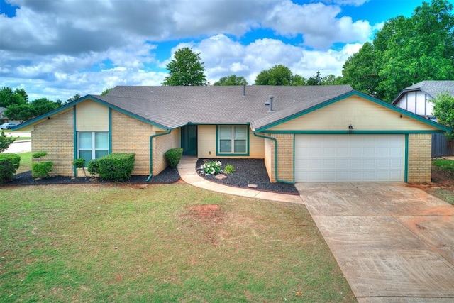 ranch-style house featuring brick siding, an attached garage, concrete driveway, and a front lawn