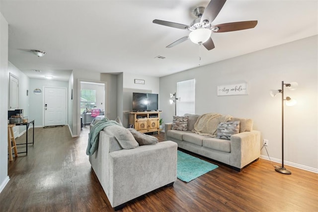 717 S Geronimo Ln, Pauls Valley, OK 73075 - living room featuring a ceiling fan, wood finished floors, and baseboards