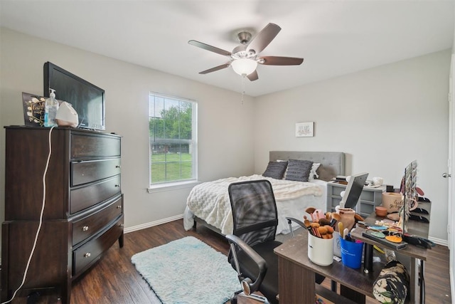 717 S Geronimo Ln, Pauls Valley, OK 73075 - bedroom featuring dark wood-style floors, baseboards, and ceiling fan