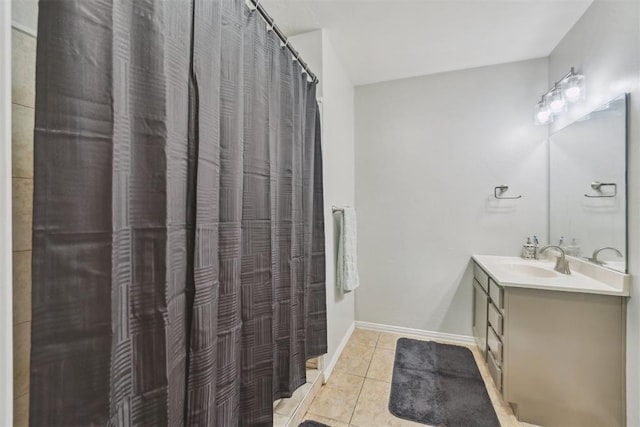 717 S Geronimo Ln, Pauls Valley, OK 73075 - full bath featuring tile patterned flooring, vanity, a shower with shower curtain, and baseboards