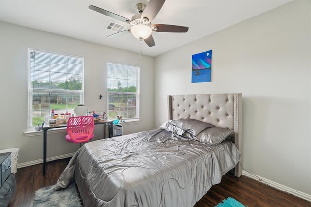 717 S Geronimo Ln, Pauls Valley, OK 73075 - bedroom featuring baseboards, wood finished floors, and ceiling fan