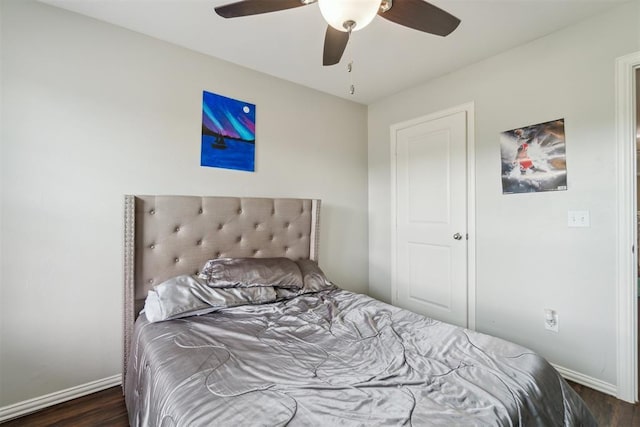 717 S Geronimo Ln, Pauls Valley, OK 73075 - bedroom with wood finished floors, baseboards, and a ceiling fan