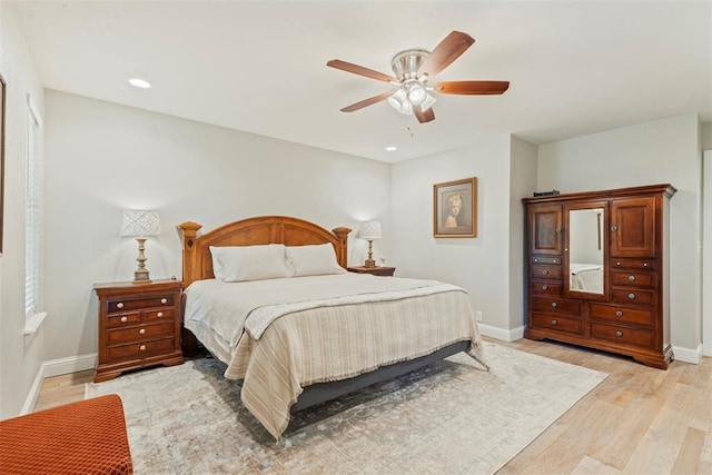 bedroom featuring light wood finished floors, baseboards, ceiling fan, and recessed lighting