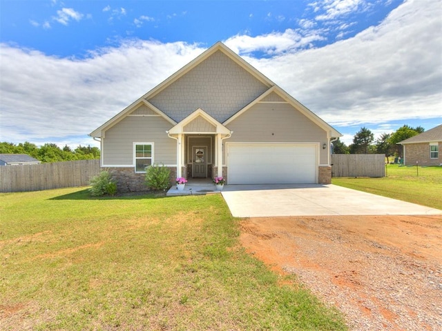 craftsman house with driveway and a garage