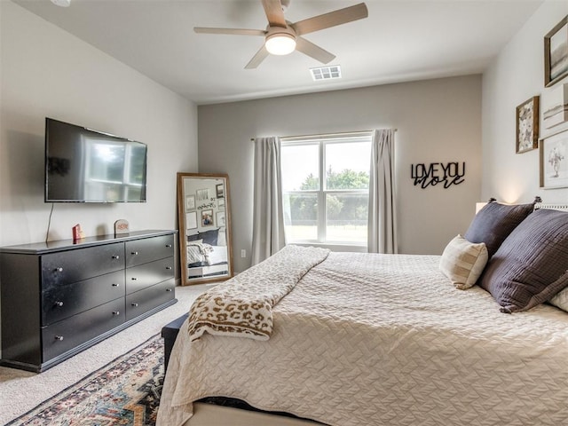 bedroom featuring carpet flooring and a ceiling fan