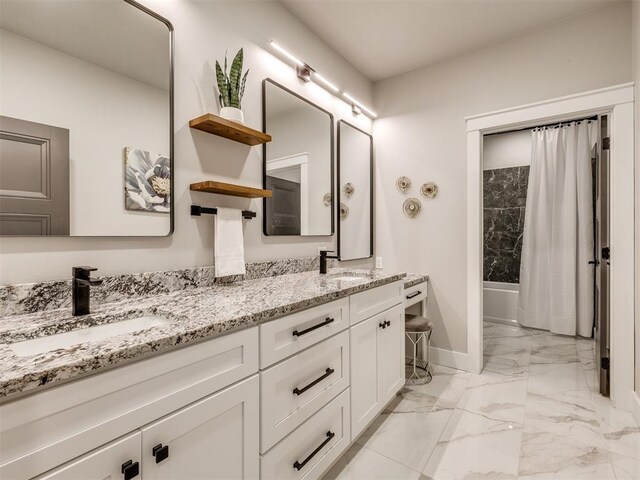 3241 E 171st St, Bixby, OK 74008 - bathroom with marble look tile flooring, baseboards, double vanity, and shower / bath combo
