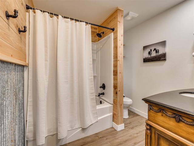 3241 E 171st St, Bixby, OK 74008 - bathroom with toilet, wood finished floors, shower / tub combo, baseboards, and vanity