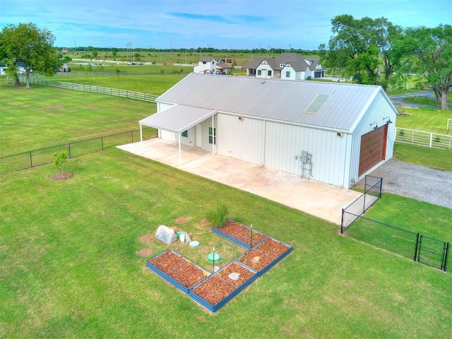 3241 E 171st St, Bixby, OK 74008 - back of property featuring a detached garage, gravel driveway, and metal roof