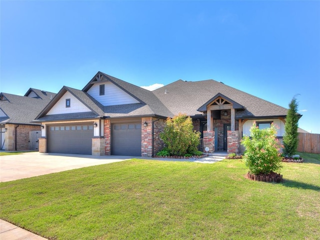 craftsman inspired home featuring driveway, an attached garage, a shingled roof, and brick siding