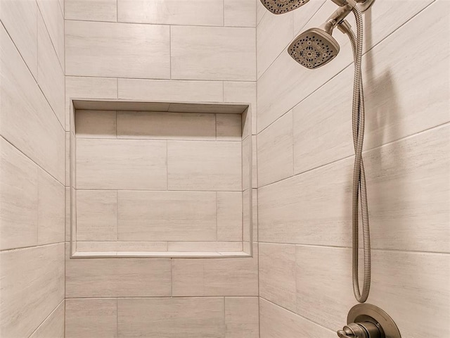 bathroom view of tiled shower