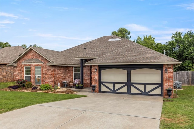 13141 Austrian Pine Dr, Choctaw, OK 73020 - ranch-style house featuring roof with shingles, driveway, brick siding, and a garage