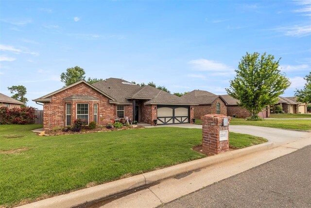 13141 Austrian Pine Dr, Choctaw, OK 73020 - view of front facade with brick siding, a garage, concrete driveway, a front lawn, and a shingled roof