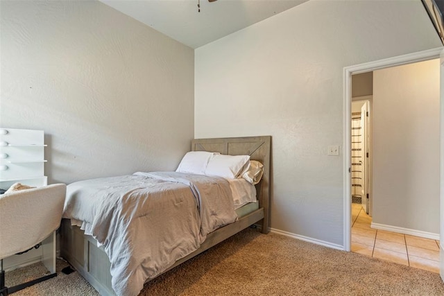 13141 Austrian Pine Dr, Choctaw, OK 73020 - tiled bedroom with carpet flooring, lofted ceiling, and baseboards