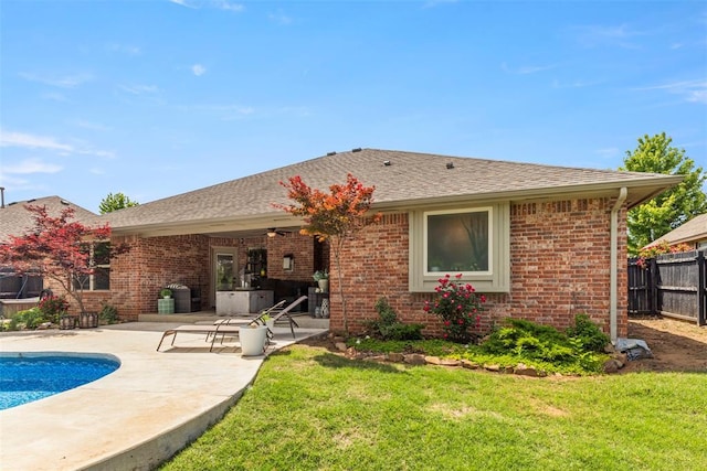13141 Austrian Pine Dr, Choctaw, OK 73020 - rear view of property featuring a patio area, brick siding, a shingled roof, and ceiling fan