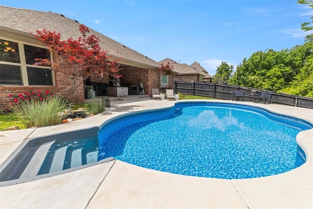 13141 Austrian Pine Dr, Choctaw, OK 73020 - view of swimming pool featuring a patio area and a fenced backyard