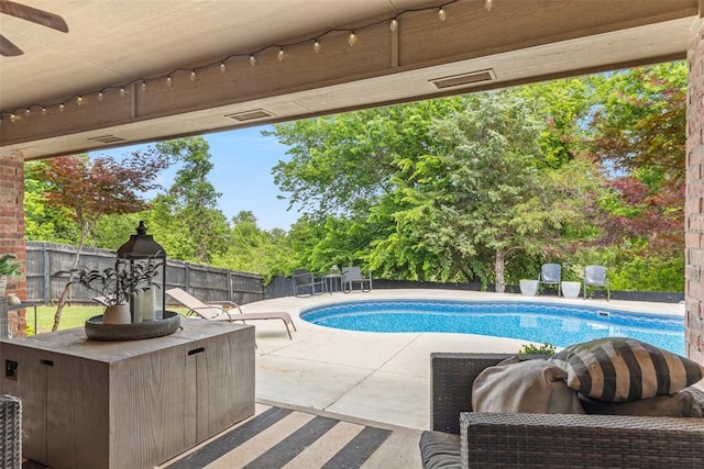 13141 Austrian Pine Dr, Choctaw, OK 73020 - view of pool with a patio, a fenced backyard, a ceiling fan, and view of scattered trees