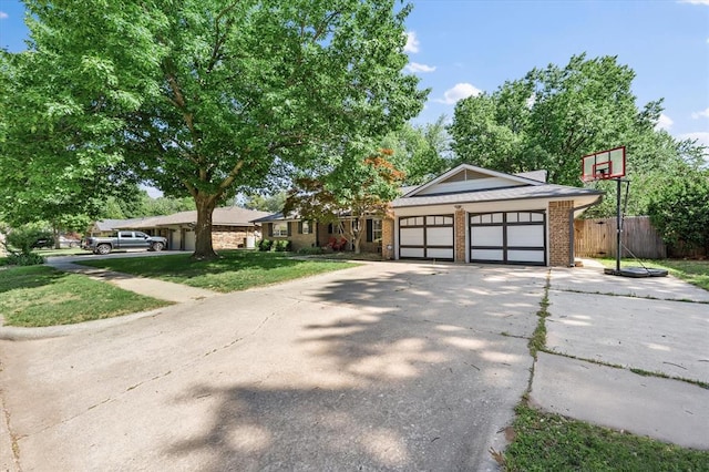 3926 Briarcrest Dr, Norman, OK 73072 - single story home featuring concrete driveway, brick siding, and an attached garage