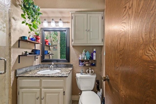 3926 Briarcrest Dr, Norman, OK 73072 - bathroom with vanity, toilet, and a textured wall