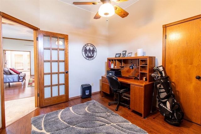 717 Hunters Run, Midwest City, OK 73130 - office space featuring ceiling fan, wood finished floors, a towering ceiling, and baseboards