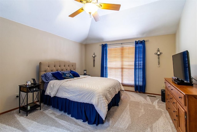 717 Hunters Run, Midwest City, OK 73130 - bedroom with light carpet, vaulted ceiling, baseboards, and ceiling fan