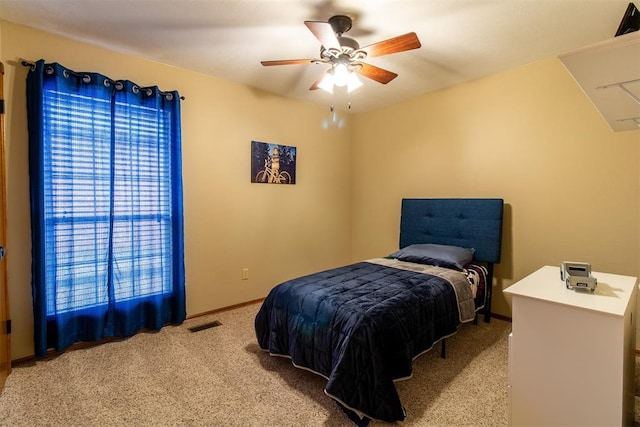 717 Hunters Run, Midwest City, OK 73130 - bedroom with carpet, ceiling fan, and baseboards