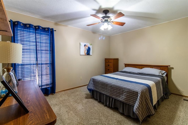 717 Hunters Run, Midwest City, OK 73130 - bedroom featuring carpet flooring, baseboards, and a ceiling fan