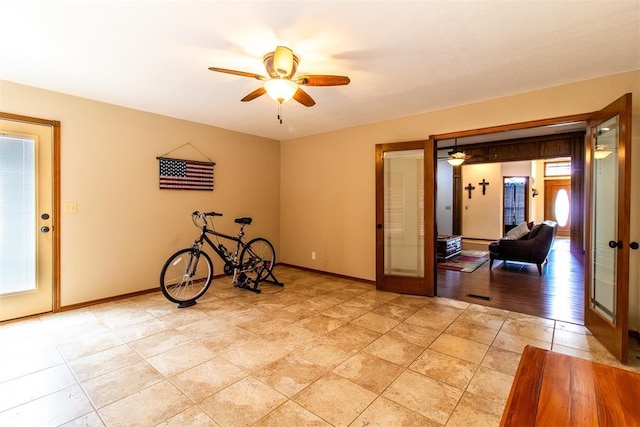 717 Hunters Run, Midwest City, OK 73130 - empty room featuring ceiling fan and baseboards