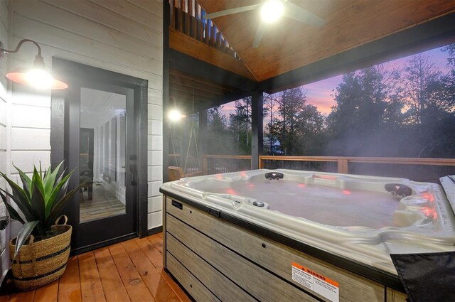 48 Cedar Hills Trl, Broken Bow, OK 74728 - deck at dusk with a hot tub