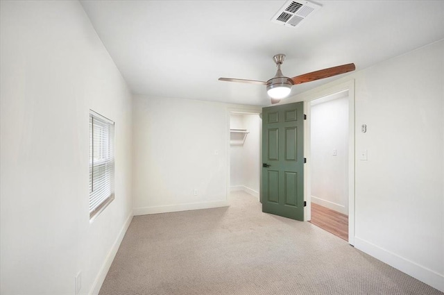825 W Colorado Ave, Chickasha, OK 73018 - spare room with carpet floors, baseboards, and ceiling fan