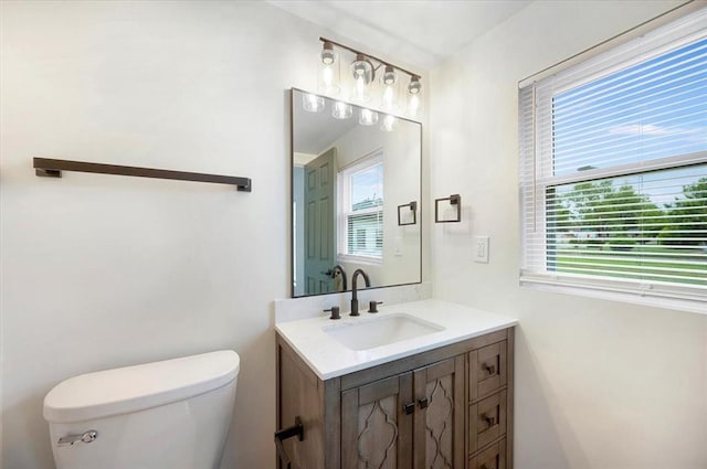 825 W Colorado Ave, Chickasha, OK 73018 - half bathroom with toilet and vanity
