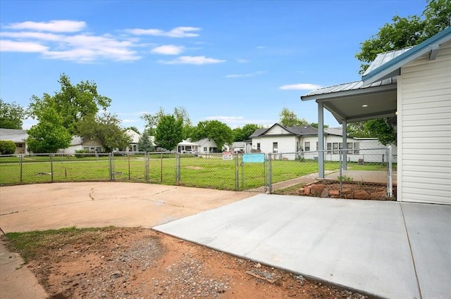 825 W Colorado Ave, Chickasha, OK 73018 - view of patio with a gate and a residential view